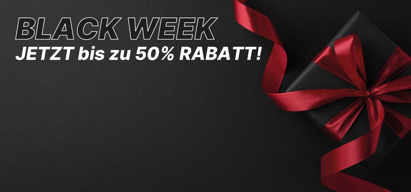 schwarzes Bild mit schwarzes Geschenk mt roter Schleife Text Black Week