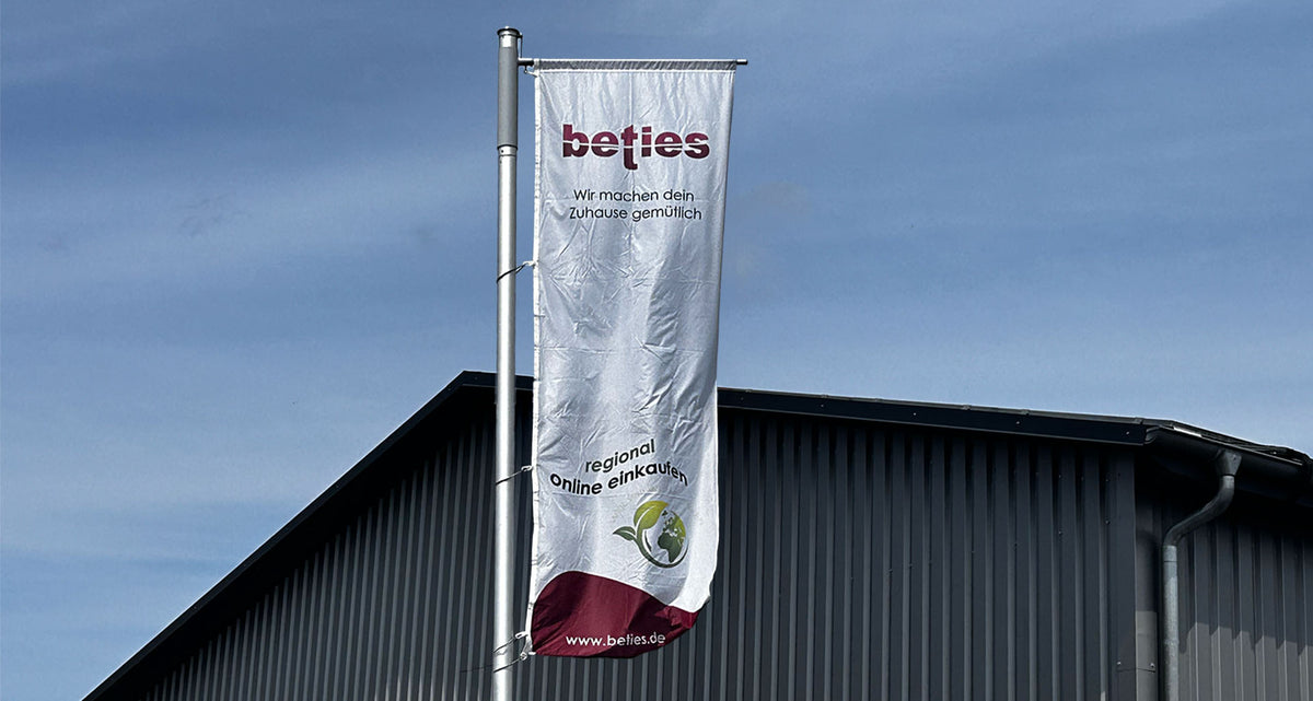 beties heimtextil flagge vor dem unternehmen