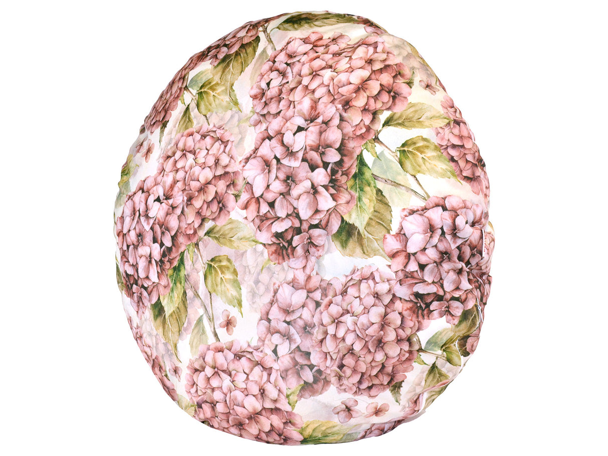 Gebluemter, runder Kissenbezug im Landhausstil, bedruckt mit rosa/pinken Hortensien-Blueten.