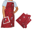 Rote Kinderlatzschuerze mit einer Tasche. Bedruckt mit rot-grau-schwarzen Voegeln auf Zweigen mit roten Beeren sitzend. Daneben liegt ein Kinder Kochhandschuh, eine kleines Abtrocknetuch und eine kleine Mitteldecke.