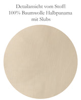 Vergroeserung der Stoffstruktur. Darauf sind die unregelmaessigen Verdickungen (Slups) des Fadens erkennbar.