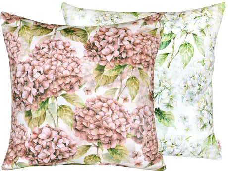 Gebluemte Kissenbezuege im Landhausstil, bedruckt mit rosa/pinken oder weissen Hortensien-Blueten.