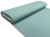 Musselin Stoffrolle in türkis.
