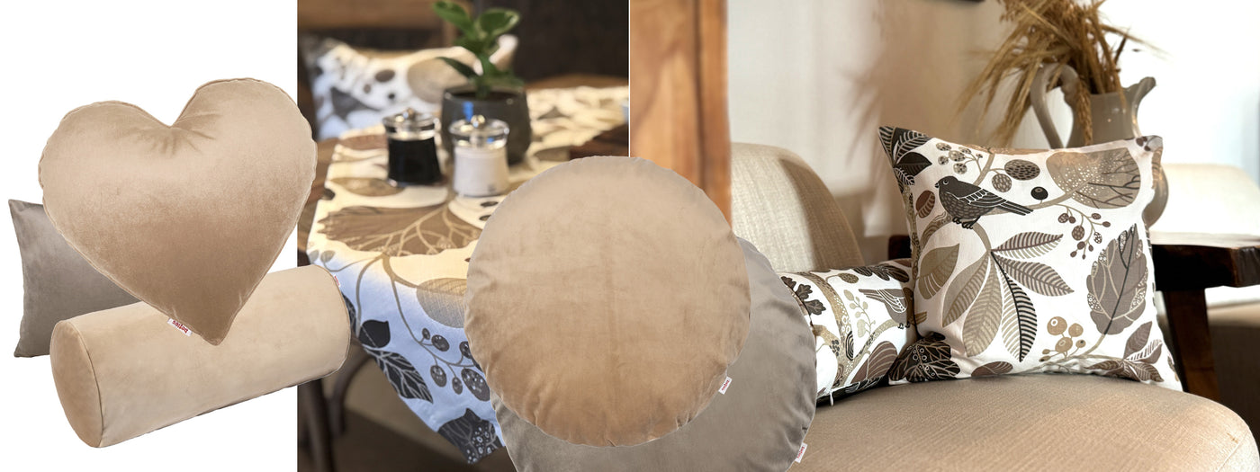 gedeckter Tisch mit Zauberwald taupe Tischdecke und geütlicher Sessel mit Weizenähren im Hintergrund Vodergrund Samt Kissen in taupe und beige